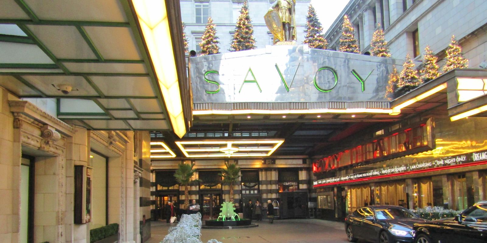 The entrance court of the Savoy Hotel in London with its steel Savoy sign above the canopy